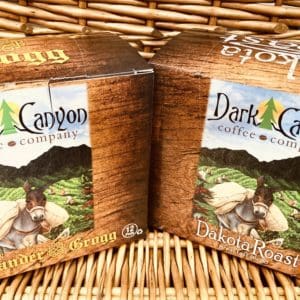Two boxes of brown dark canyon coffee k cups