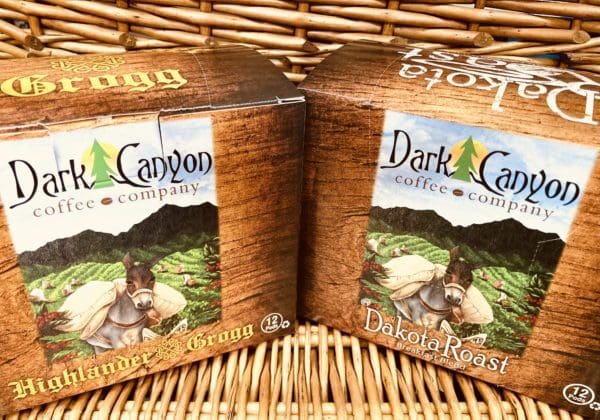 Two boxes of brown dark canyon coffee k cups