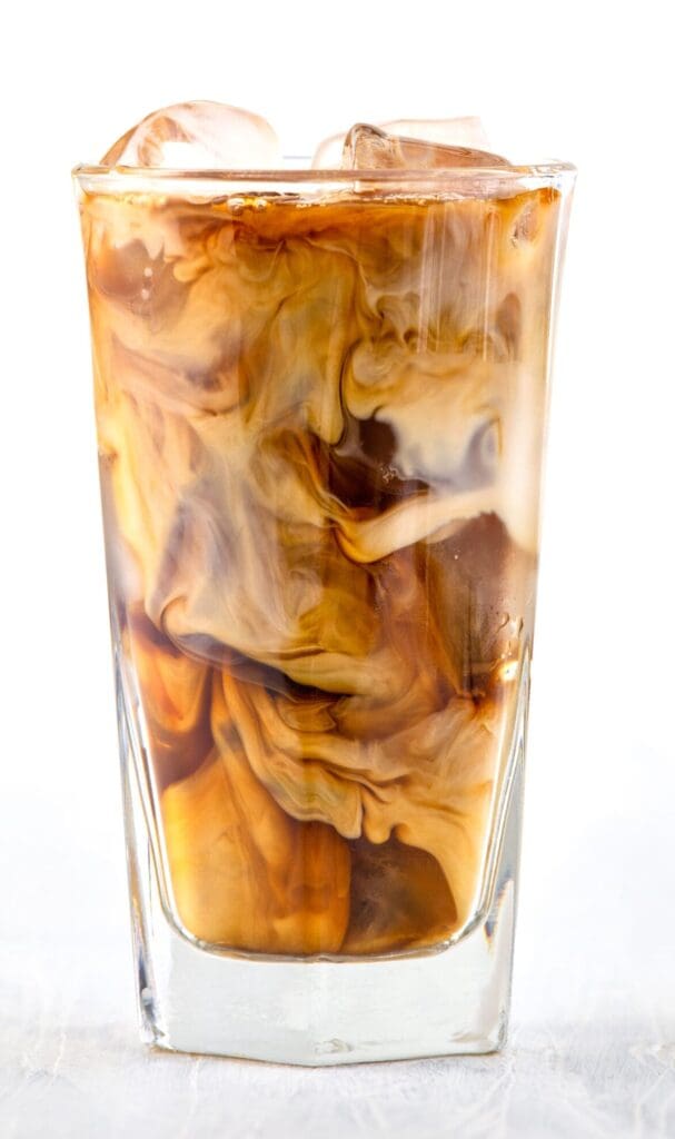 iced coffee and milk in clear glass